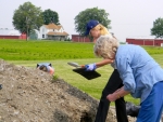 Mother/Daughter digging