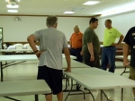 How many NGGA members does it take to set up for the antique show?